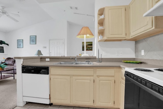 kitchen with sink, ceiling fan, light tile patterned floors, white appliances, and lofted ceiling