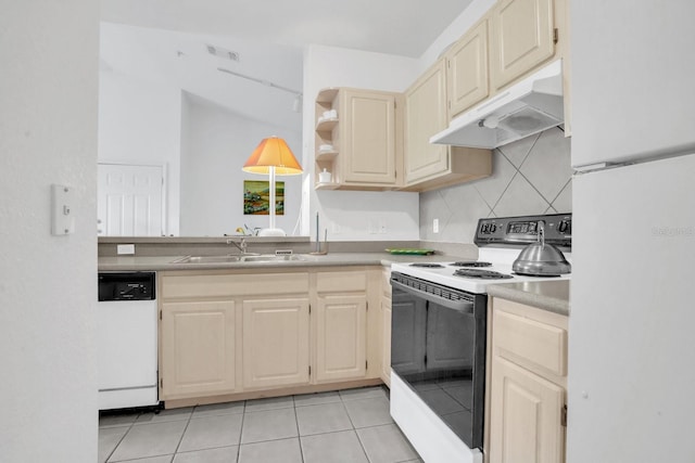 kitchen featuring white appliances, sink, decorative backsplash, and light tile patterned flooring