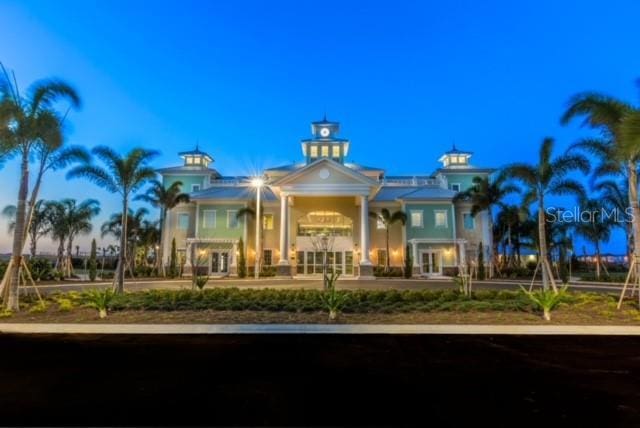 view of property at dusk