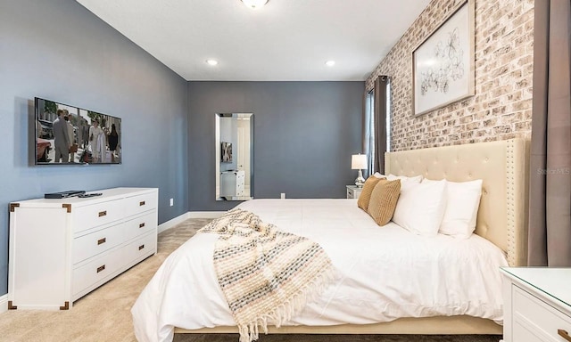 bedroom featuring light carpet, recessed lighting, and baseboards