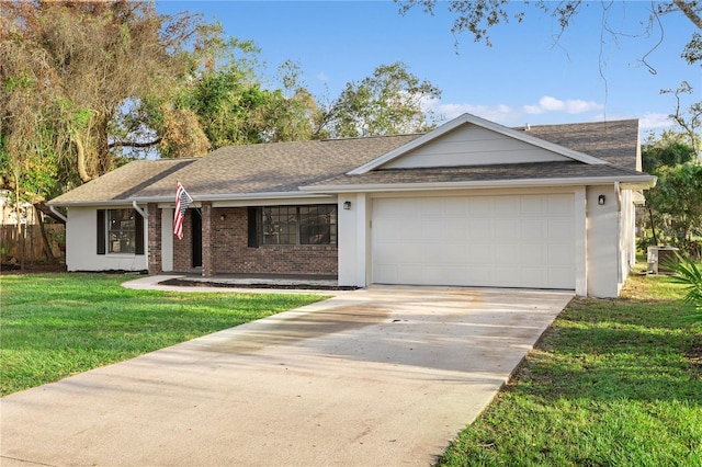 ranch-style house with a garage and a front lawn