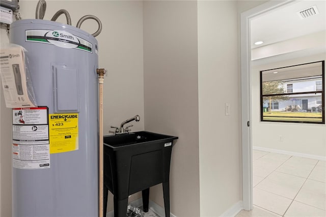 utility room with water heater