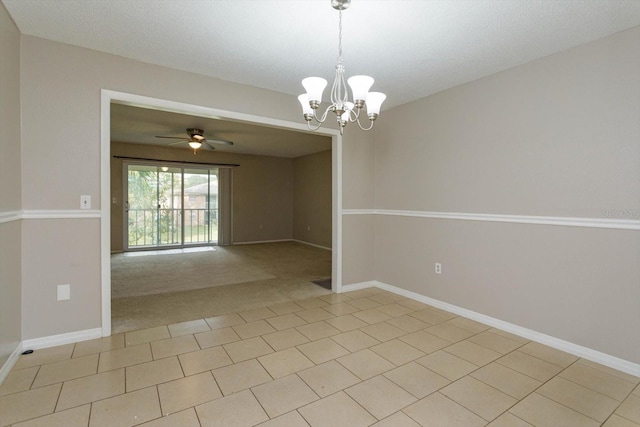 unfurnished room with a textured ceiling, light colored carpet, and ceiling fan with notable chandelier