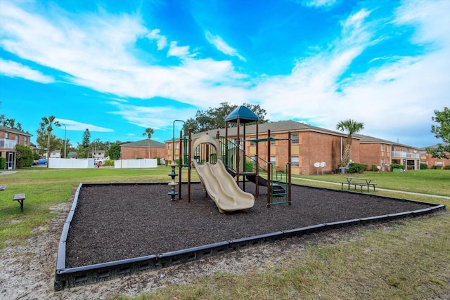 view of play area with a yard