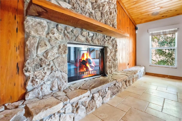 room details with a fireplace and wooden ceiling