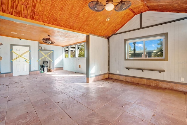 interior space featuring wood walls, a healthy amount of sunlight, and wood ceiling