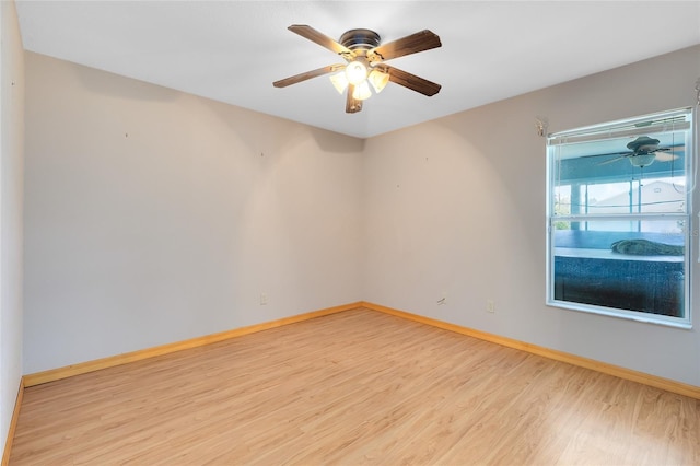 spare room with ceiling fan and light hardwood / wood-style floors