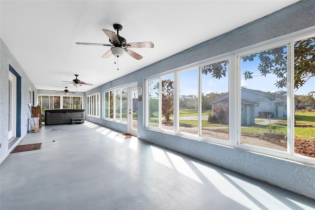 unfurnished sunroom with a healthy amount of sunlight