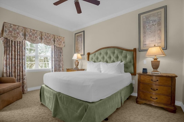 bedroom with ceiling fan, crown molding, and light colored carpet