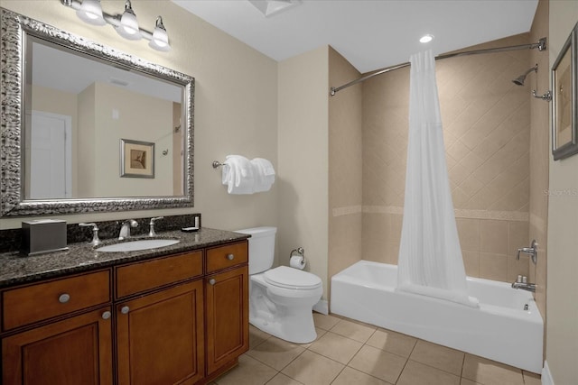 full bathroom with vanity, tile patterned flooring, shower / bath combo, and toilet