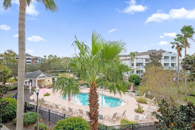 view of swimming pool featuring a patio