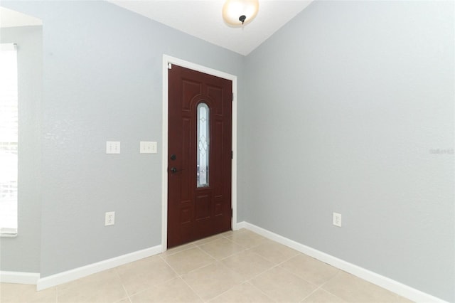 entryway featuring light tile patterned floors