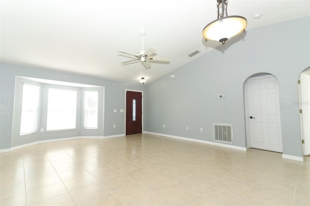 interior space with ceiling fan and lofted ceiling