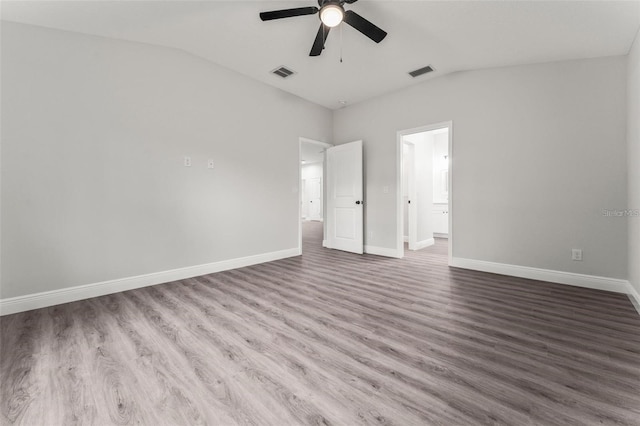 unfurnished bedroom featuring wood-type flooring, ceiling fan, and lofted ceiling