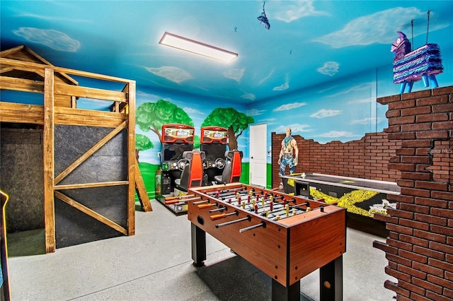 rec room with brick wall