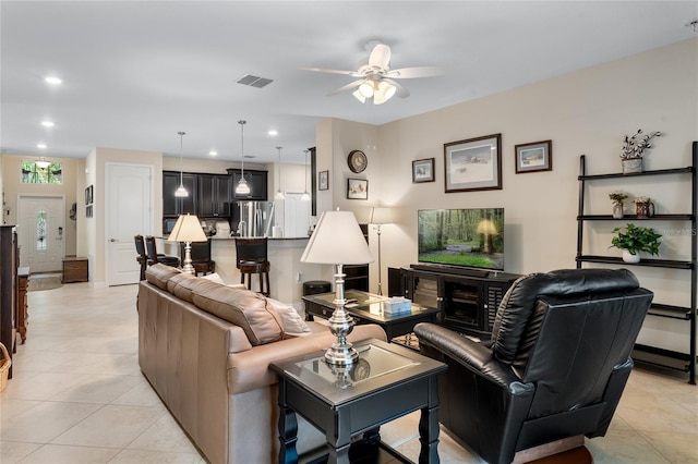 5307 Cortland Dr, Davenport, FL 33837 - living room featuring a ceiling fan, light tile patterned flooring, and recessed lighting