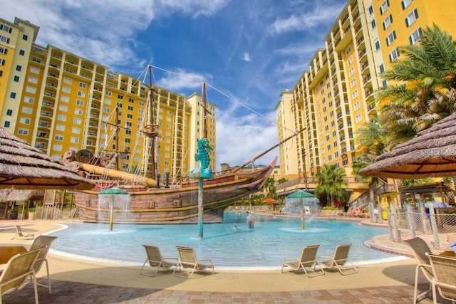 view of pool featuring pool water feature