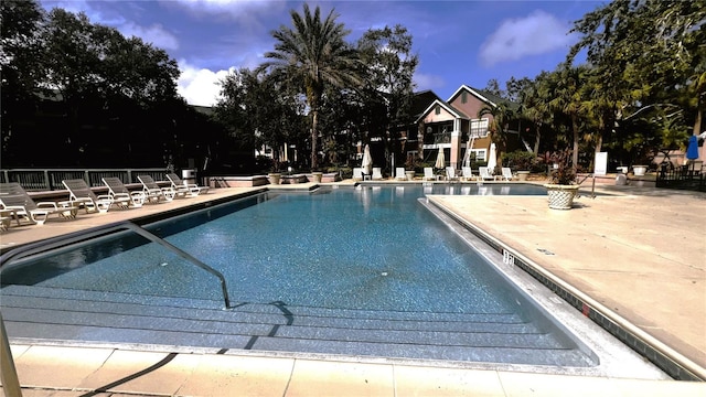 view of pool featuring a patio area