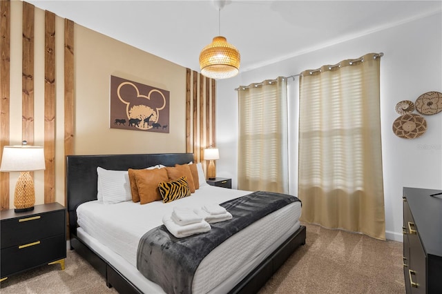 bedroom featuring light colored carpet