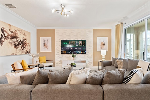 living room featuring crown molding and a notable chandelier