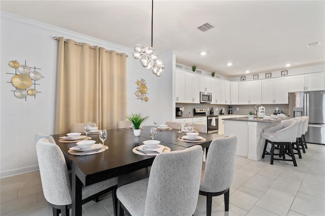 tiled dining space with ornamental molding