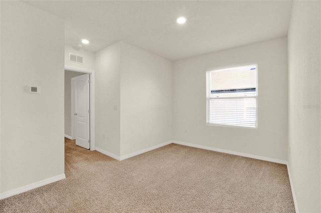 view of carpeted spare room