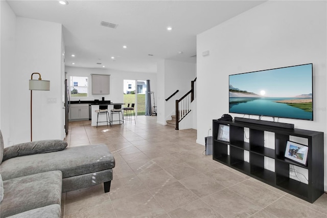 living room featuring light tile patterned flooring