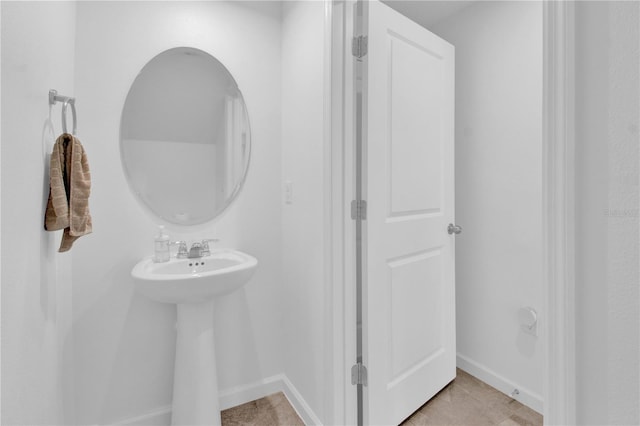 bathroom with tile patterned flooring