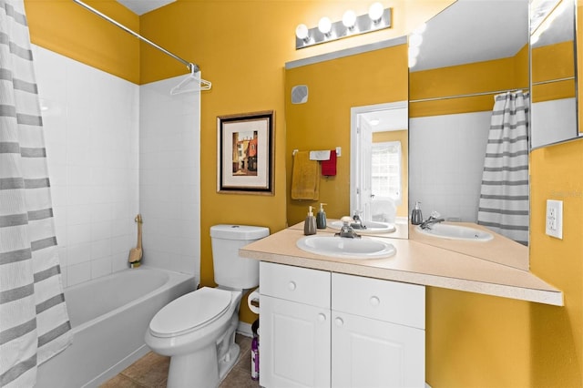 full bathroom with tile patterned flooring, vanity, toilet, and shower / bathtub combination with curtain