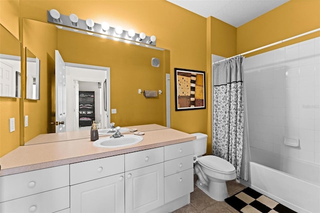 full bathroom featuring tile patterned flooring, vanity, shower / bath combo with shower curtain, and toilet