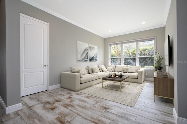 living room featuring light hardwood / wood-style floors and crown molding