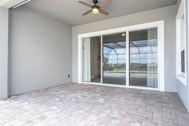 view of patio with ceiling fan