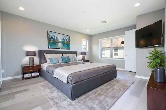 bedroom featuring light wood-type flooring