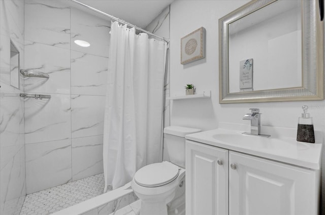 bathroom with toilet, vanity, and a shower with shower curtain