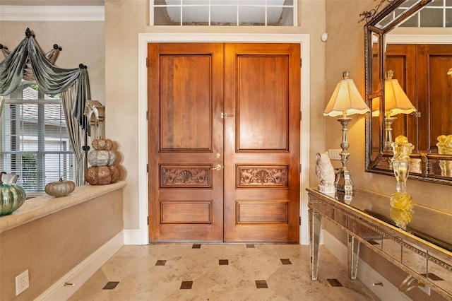 doorway to outside with crown molding