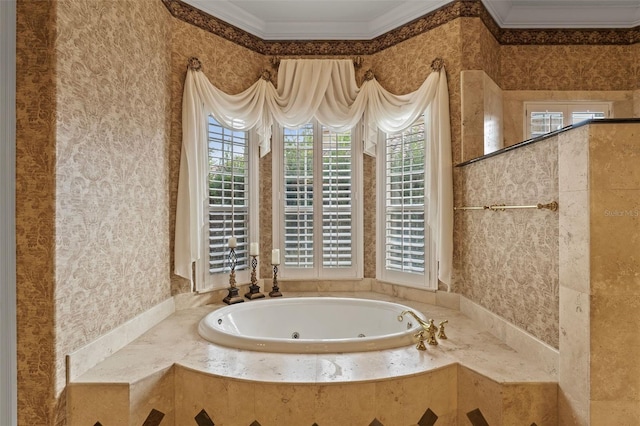 bathroom with a wealth of natural light, ornamental molding, and tiled tub