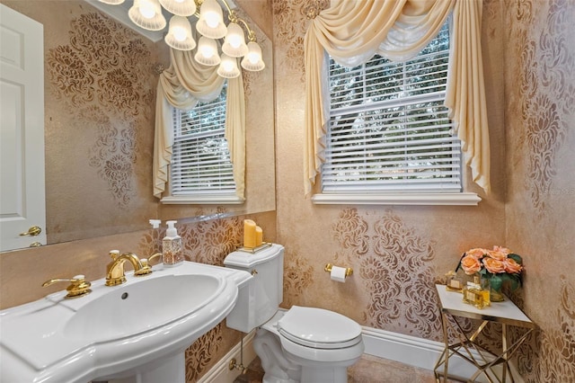 bathroom featuring sink and toilet