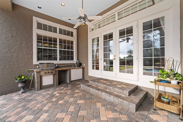 view of patio featuring grilling area, ceiling fan, and french doors