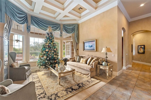 living room with a high ceiling, beam ceiling, ornamental molding, and coffered ceiling