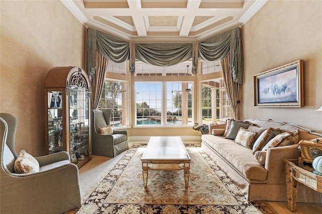 interior space featuring beam ceiling, ornamental molding, a high ceiling, and coffered ceiling