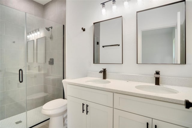 16270 SW 29th Court Rd, Ocala, FL 34473 - full bath with double vanity, a shower stall, and toilet