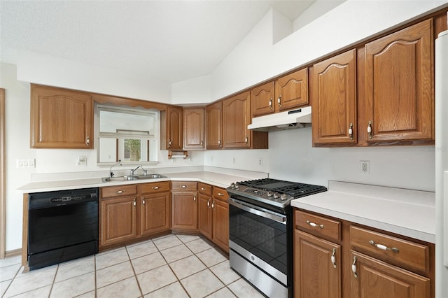 kitchen featuring sink, black dishwasher, light tile patterned flooring, and stainless steel range with gas stovetop