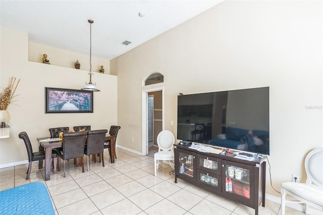 dining area with light tile patterned floors