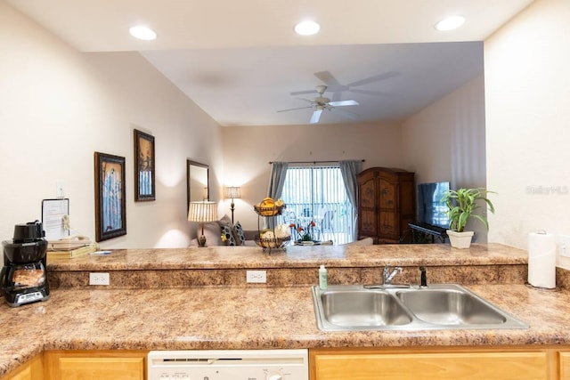 kitchen featuring light brown cabinetry, white dishwasher, sink, and ceiling fan