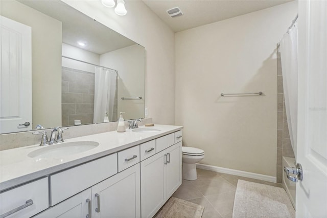 full bathroom with vanity, shower / bath combo with shower curtain, tile patterned flooring, and toilet