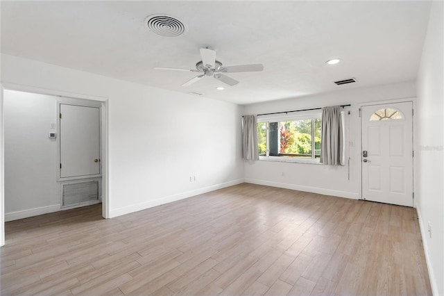 interior space with ceiling fan and light wood-type flooring