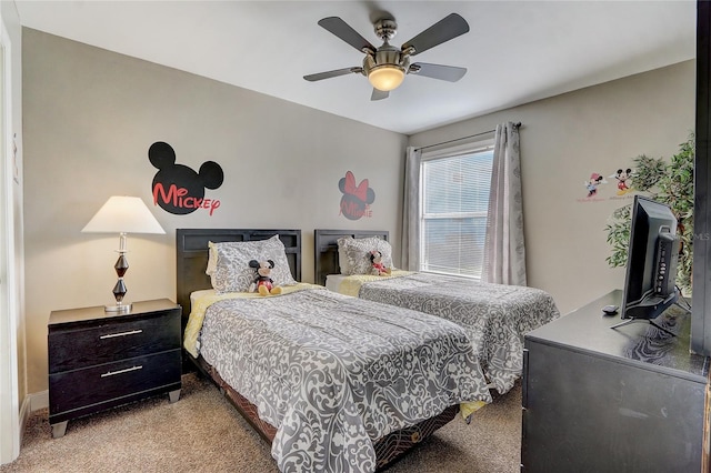 bedroom featuring ceiling fan and light colored carpet