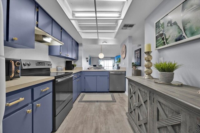 kitchen with stainless steel appliances, hanging light fixtures, blue cabinetry, and light hardwood / wood-style flooring