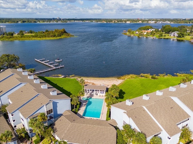 drone / aerial view with a water view