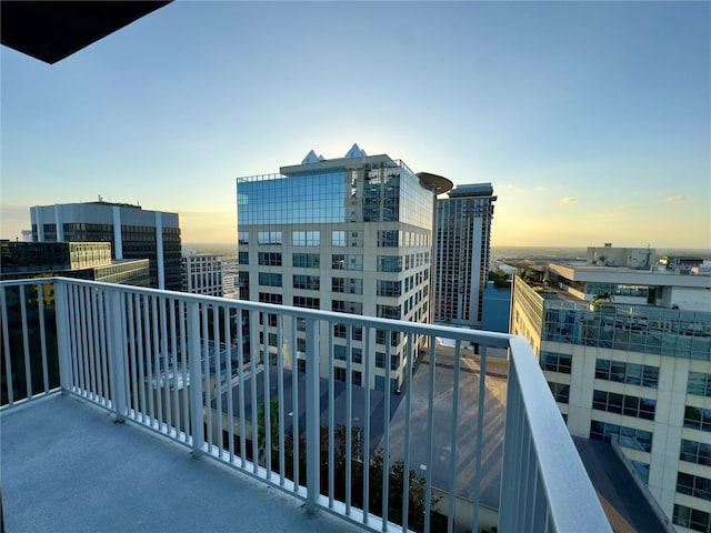 view of balcony at dusk